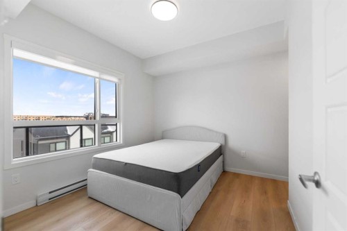 6403-20295 Seton Way Se, Calgary, AB - Indoor Photo Showing Bedroom