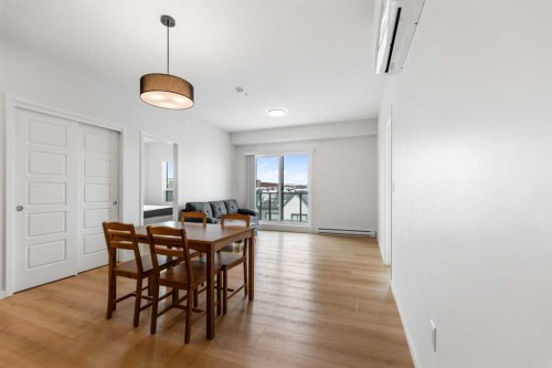 6403-20295 Seton Way Se, Calgary, AB - Indoor Photo Showing Dining Room