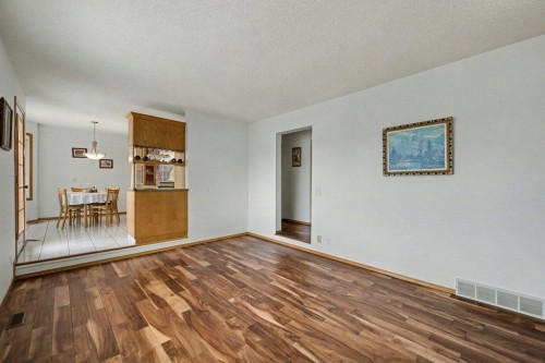 16 Straddock Crescent Sw, Calgary, AB - Indoor Photo Showing Other Room