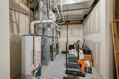16 Straddock Crescent Sw, Calgary, AB - Indoor Photo Showing Basement