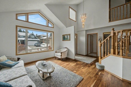 16 Straddock Crescent Sw, Calgary, AB - Indoor Photo Showing Living Room