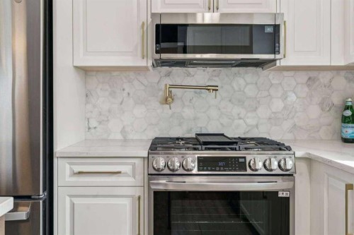 15 Brookmere Place Sw, Calgary, AB - Indoor Photo Showing Kitchen