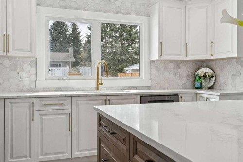 15 Brookmere Place Sw, Calgary, AB - Indoor Photo Showing Kitchen With Upgraded Kitchen