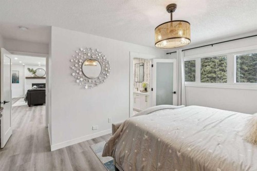 15 Brookmere Place Sw, Calgary, AB - Indoor Photo Showing Bedroom