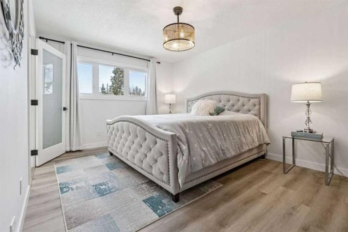 15 Brookmere Place Sw, Calgary, AB - Indoor Photo Showing Bedroom