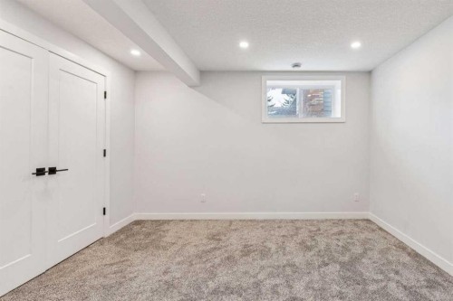 15 Brookmere Place Sw, Calgary, AB - Indoor Photo Showing Other Room