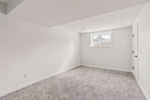 15 Brookmere Place Sw, Calgary, AB - Indoor Photo Showing Other Room
