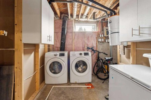 15 Brookmere Place Sw, Calgary, AB - Indoor Photo Showing Laundry Room