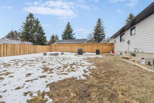 15 Brookmere Place Sw, Calgary, AB - Outdoor