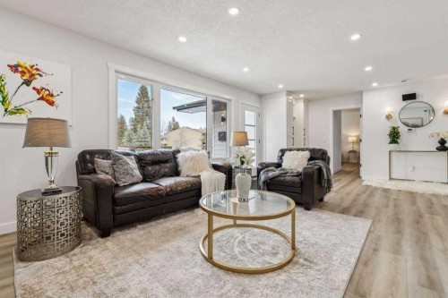 15 Brookmere Place Sw, Calgary, AB - Indoor Photo Showing Living Room