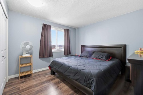 24 Huntstrom Road Ne, Calgary, AB - Indoor Photo Showing Bedroom
