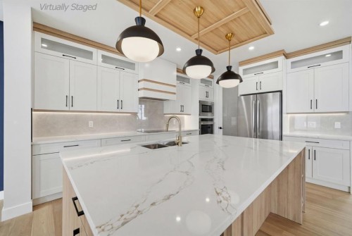 2005 Waterbury Road, Chestermere, AB - Indoor Photo Showing Kitchen With Upgraded Kitchen