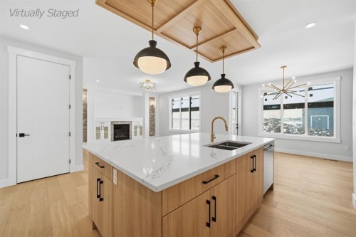 2005 Waterbury Road, Chestermere, AB - Indoor Photo Showing Kitchen With Double Sink