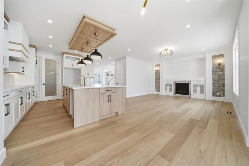 2005 Waterbury Road, Chestermere, AB - Indoor With Fireplace