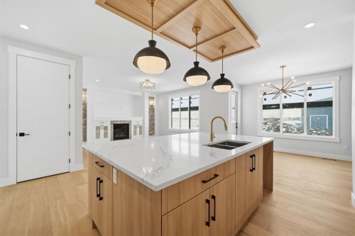 2005 Waterbury Road, Chestermere, AB - Indoor Photo Showing Kitchen With Double Sink