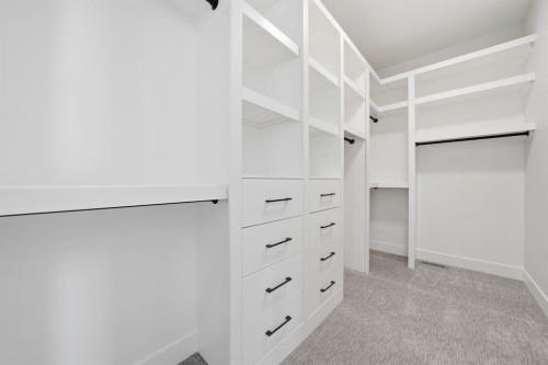 2005 Waterbury Road, Chestermere, AB - Indoor With Storage