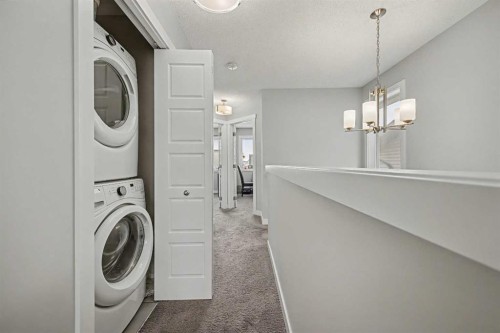 38 Sage Bluff Gate Nw, Calgary, AB - Indoor Photo Showing Laundry Room