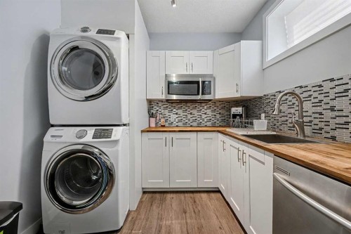 38 Sage Bluff Gate Nw, Calgary, AB - Indoor Photo Showing Laundry Room