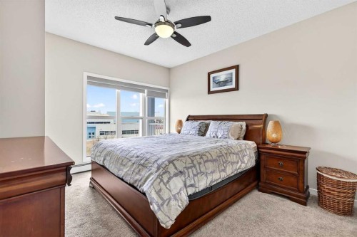 308-402 Marquis Lane Se, Calgary, AB - Indoor Photo Showing Bedroom