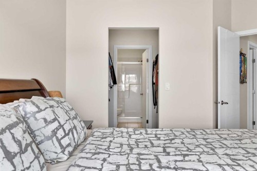 308-402 Marquis Lane Se, Calgary, AB - Indoor Photo Showing Bedroom