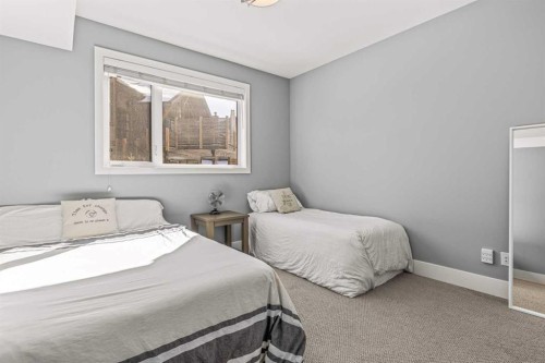 201G-1101 Three Sisters Parkway, Canmore, AB - Indoor Photo Showing Bedroom