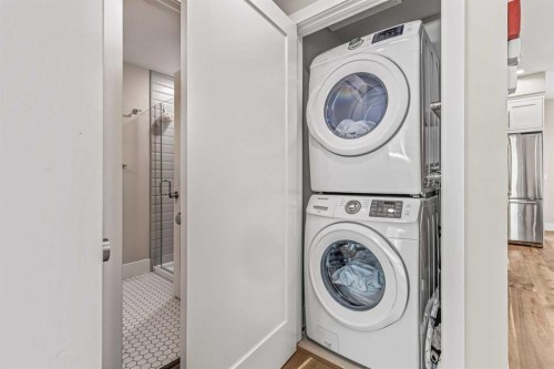 201G-1101 Three Sisters Parkway, Canmore, AB - Indoor Photo Showing Laundry Room