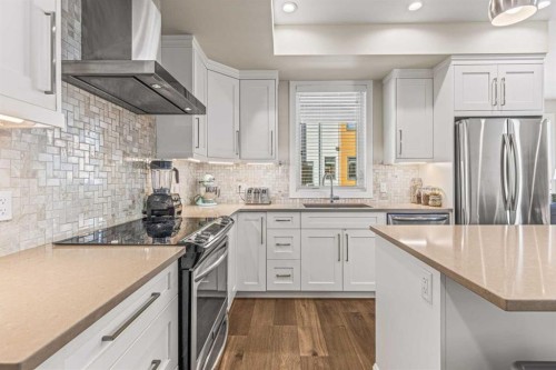201G-1101 Three Sisters Parkway, Canmore, AB - Indoor Photo Showing Kitchen With Stainless Steel Kitchen With Upgraded Kitchen