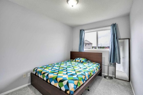 235 Saddlemead Road Ne, Calgary, AB - Indoor Photo Showing Bedroom