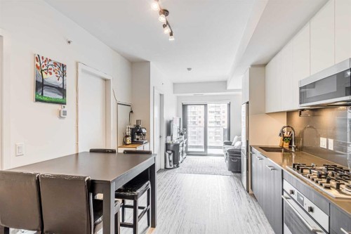 1107-730 2 Avenue Sw, Calgary, AB - Indoor Photo Showing Kitchen With Upgraded Kitchen