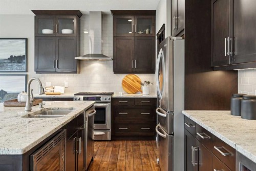 200 Aspen Summit View Sw, Calgary, AB - Indoor Photo Showing Kitchen With Stainless Steel Kitchen With Double Sink With Upgraded Kitchen