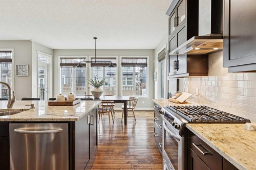 200 Aspen Summit View Sw, Calgary, AB - Indoor Photo Showing Kitchen With Upgraded Kitchen