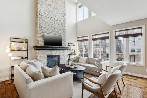 200 Aspen Summit View Sw, Calgary, AB - Indoor Photo Showing Living Room With Fireplace