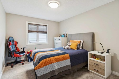 200 Aspen Summit View Sw, Calgary, AB - Indoor Photo Showing Bedroom