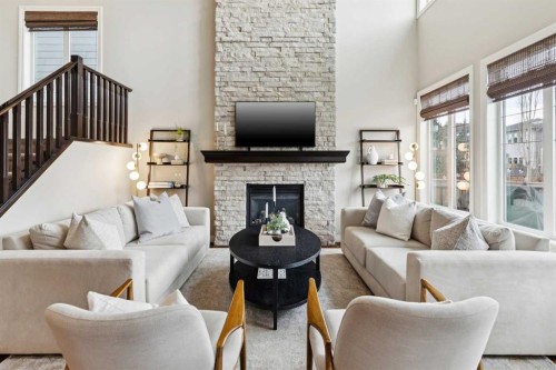 200 Aspen Summit View Sw, Calgary, AB - Indoor Photo Showing Living Room With Fireplace