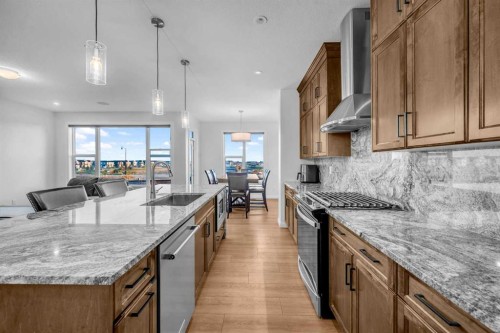 628 West Lakeview Drive, Chestermere, AB - Indoor Photo Showing Kitchen With Upgraded Kitchen