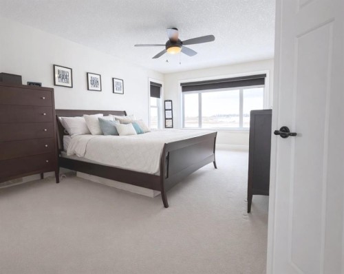 86 Muirfield Boulevard, Lyalta, AB - Indoor Photo Showing Bedroom