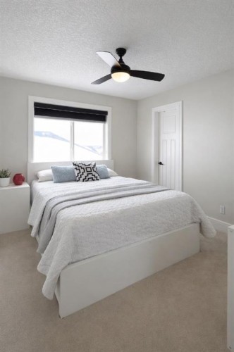 86 Muirfield Boulevard, Lyalta, AB - Indoor Photo Showing Bedroom