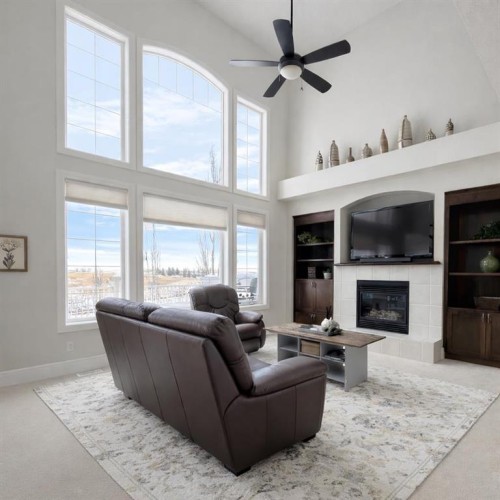 86 Muirfield Boulevard, Lyalta, AB - Indoor Photo Showing Living Room With Fireplace
