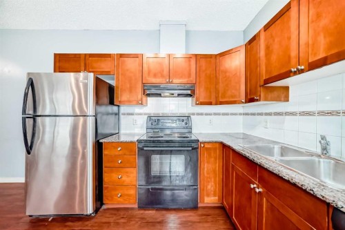 163-333 Riverfront Avenue, Calgary, AB - Indoor Photo Showing Kitchen With Double Sink