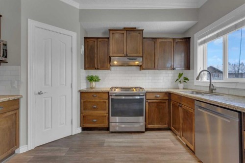 10 West Cedar Rise Sw, Calgary, AB - Indoor Photo Showing Kitchen With Stainless Steel Kitchen