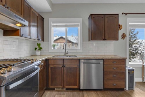 10 West Cedar Rise Sw, Calgary, AB - Indoor Photo Showing Kitchen With Stainless Steel Kitchen