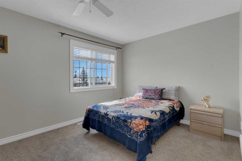 10 West Cedar Rise Sw, Calgary, AB - Indoor Photo Showing Bedroom