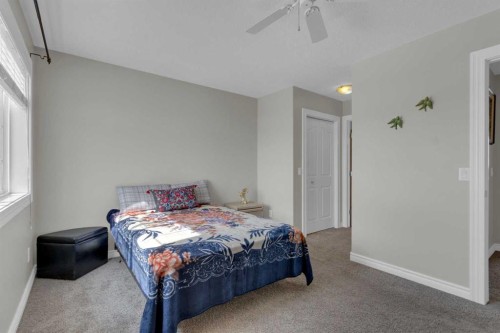 10 West Cedar Rise Sw, Calgary, AB - Indoor Photo Showing Bedroom