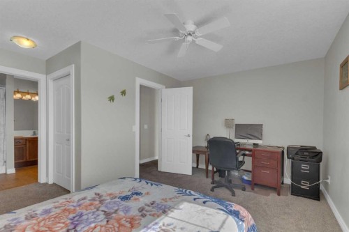 10 West Cedar Rise Sw, Calgary, AB - Indoor Photo Showing Bedroom