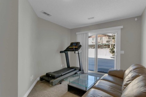 10 West Cedar Rise Sw, Calgary, AB - Indoor Photo Showing Gym Room