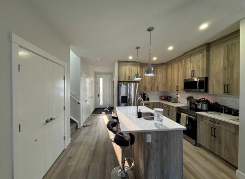 628 Cornerstone Boulevard Ne, Calgary, AB - Indoor Photo Showing Kitchen With Double Sink With Upgraded Kitchen