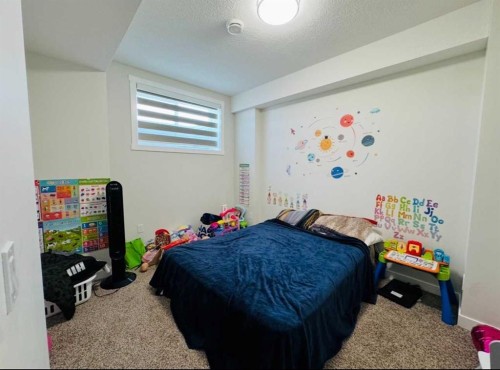 628 Cornerstone Boulevard Ne, Calgary, AB - Indoor Photo Showing Bedroom