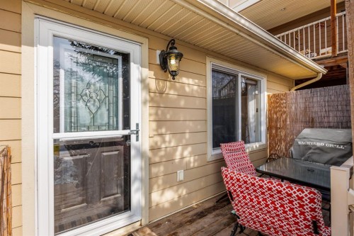 111-323 4 Avenue, Strathmore, AB - Outdoor With Deck Patio Veranda With Exterior