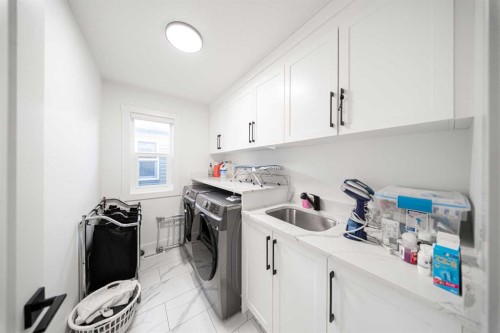 123 Saddlecrest Grove Ne, Calgary, AB - Indoor Photo Showing Laundry Room