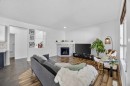 340 Prestwick Terrace Se, Calgary, AB  - Indoor Photo Showing Living Room With Fireplace 
